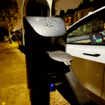 char.gy-charging-at-night-on-residential-street
