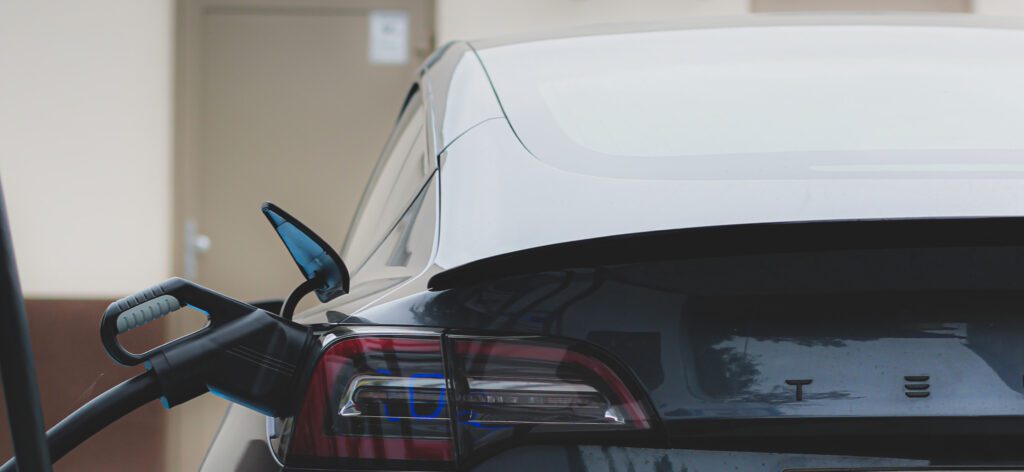 Tesla electric vehicle (EV) charging using a roadside chargepoint. 